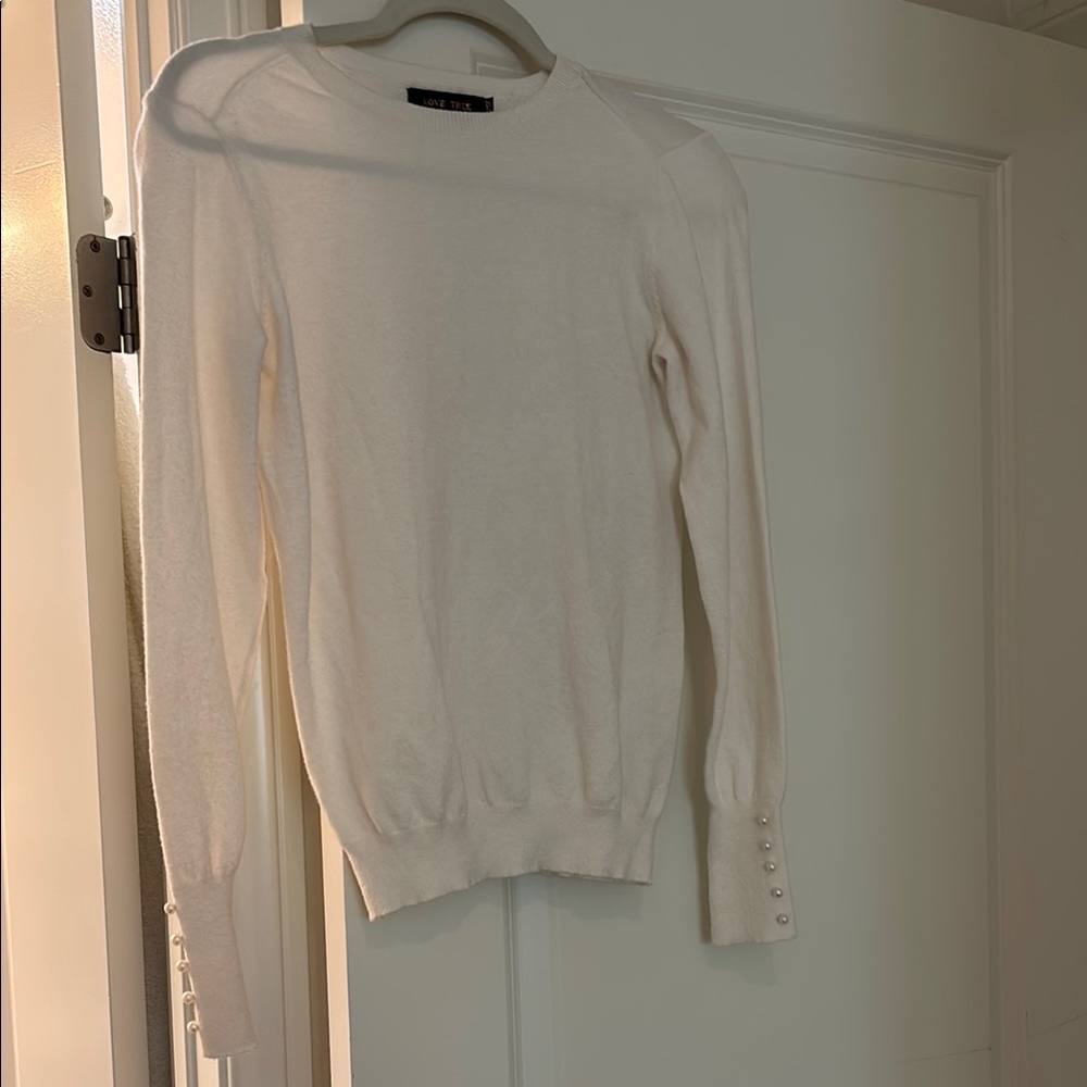 Elegant White Sweater with Pearl Button Accents